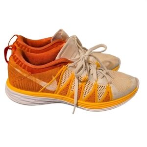 Nike Women's Flyknit Lunar 2 running sneakers in size 9.5 orange